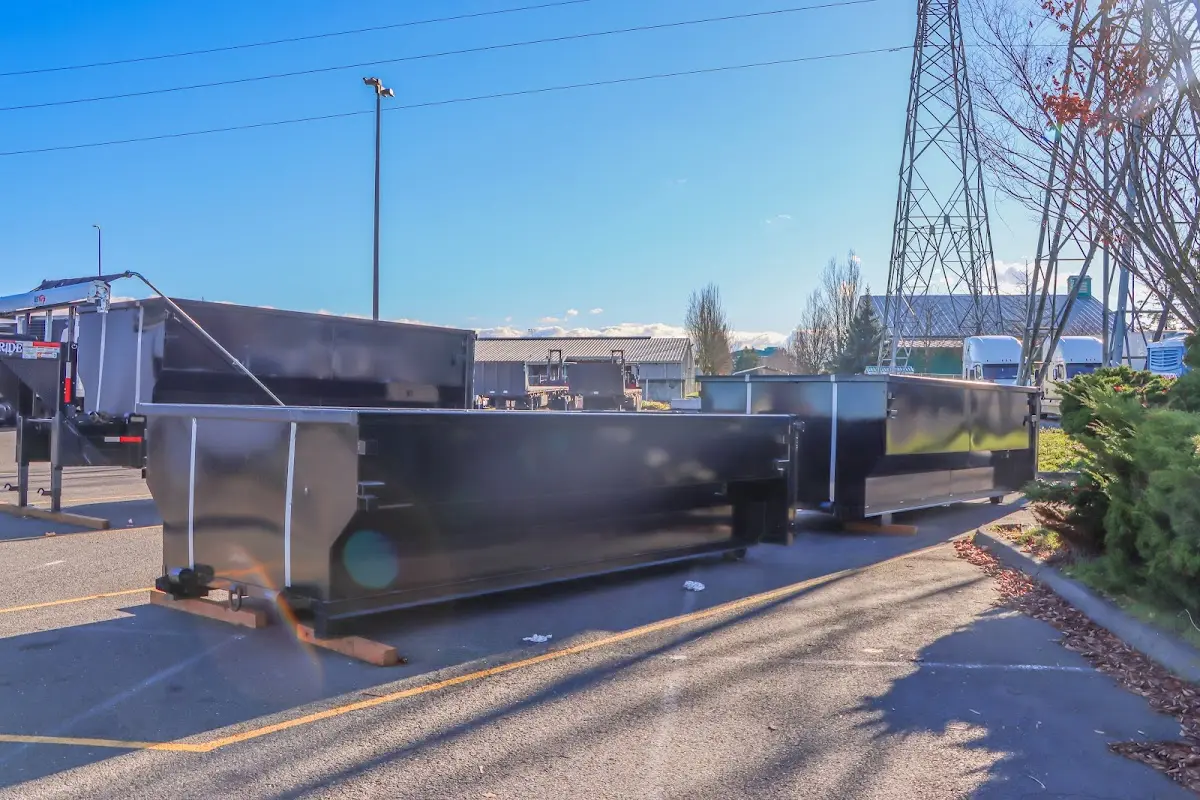 Roll-off dumpster ready for waste disposal at job site for 2 Yard Dumpster Rental in White Oak